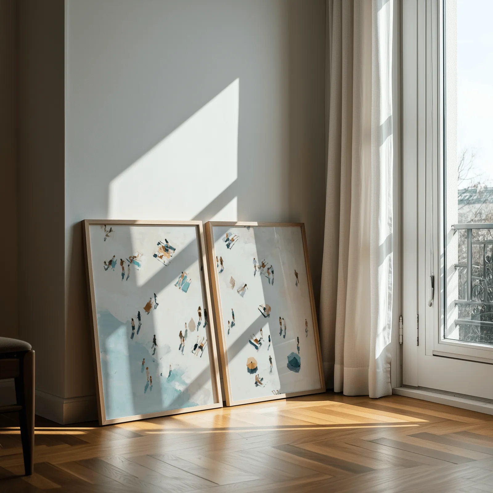 beach wall art set of 2 aerial coastal scene, leaning against a sunlit wall by a curtained balcony door