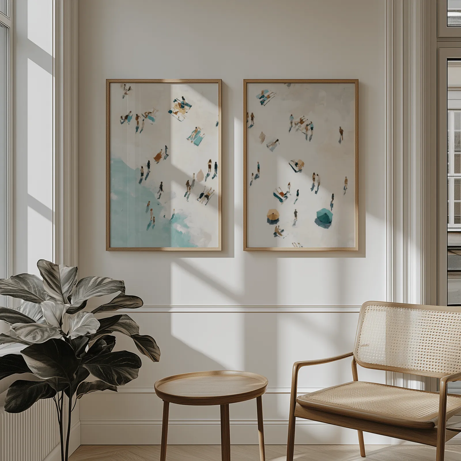 beach wall art set of 2 aerial coastal scene, above wainscoting beside a cane armchair and fiddle-leaf fig