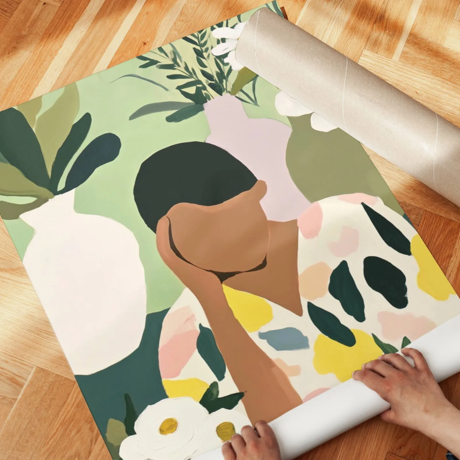botanical woman wall art in green and cream, unrolled across a herringbone parquet floor by hand