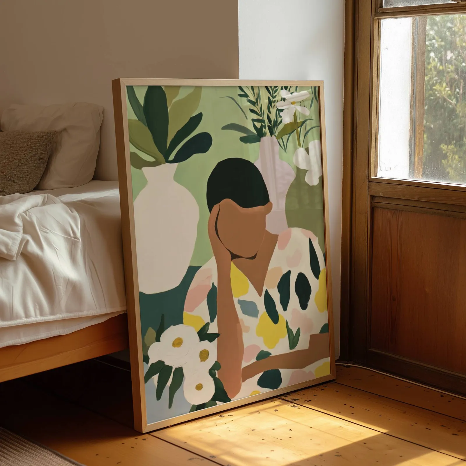 botanical woman wall art in green and cream, leaning by a sunlit window beside an unmade bed