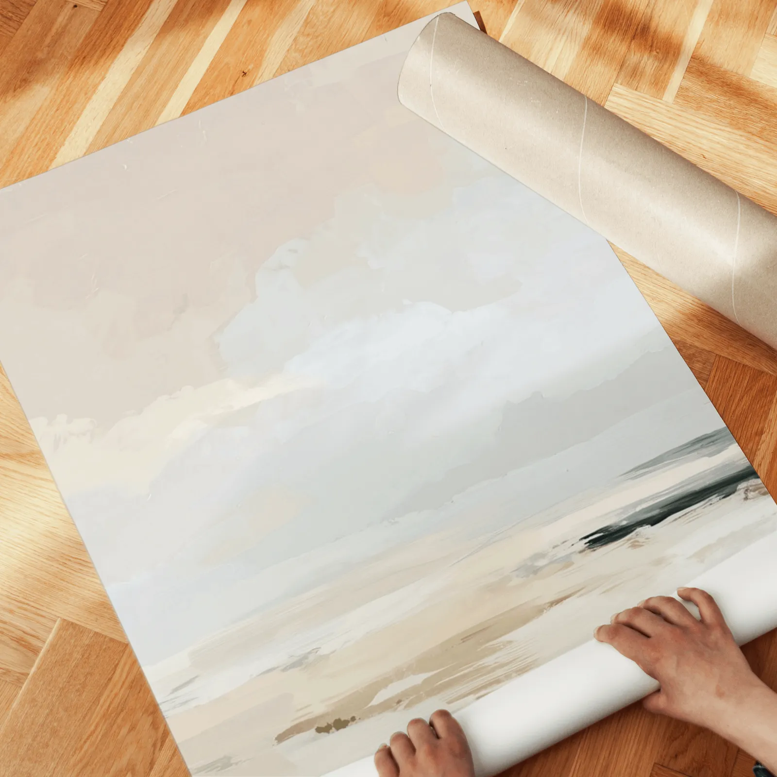 neutral coastal landscape triptych wall art, unrolled across a herringbone wood floor by hand