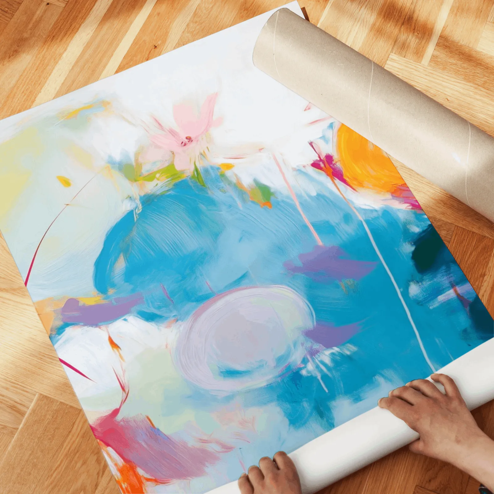 colorful abstract triptych wall art, unrolled across a herringbone wood floor by hand