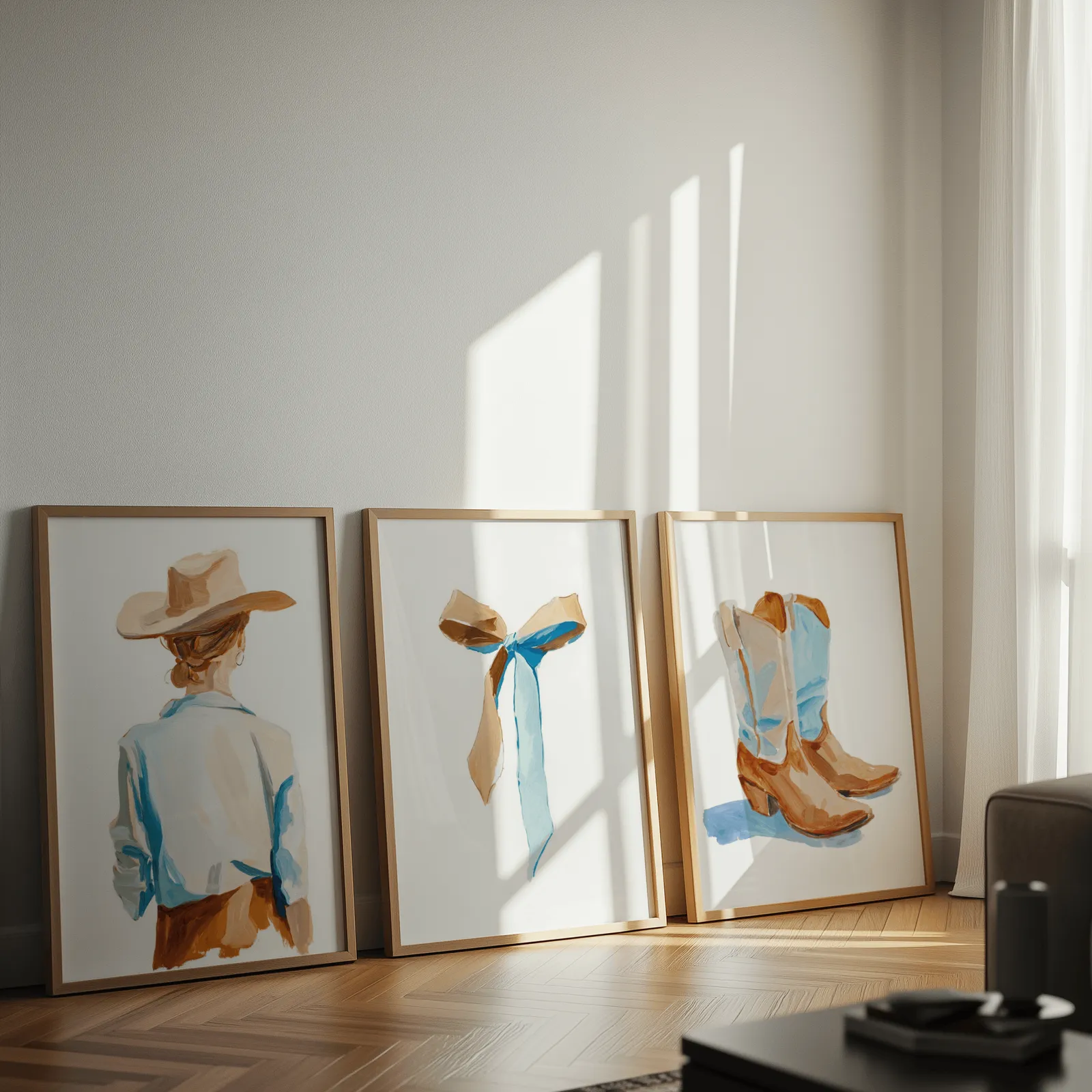western cowgirl wall art set of 3 with hat ribbon and boots, leaning against a sunlit wall on herringbone flooring