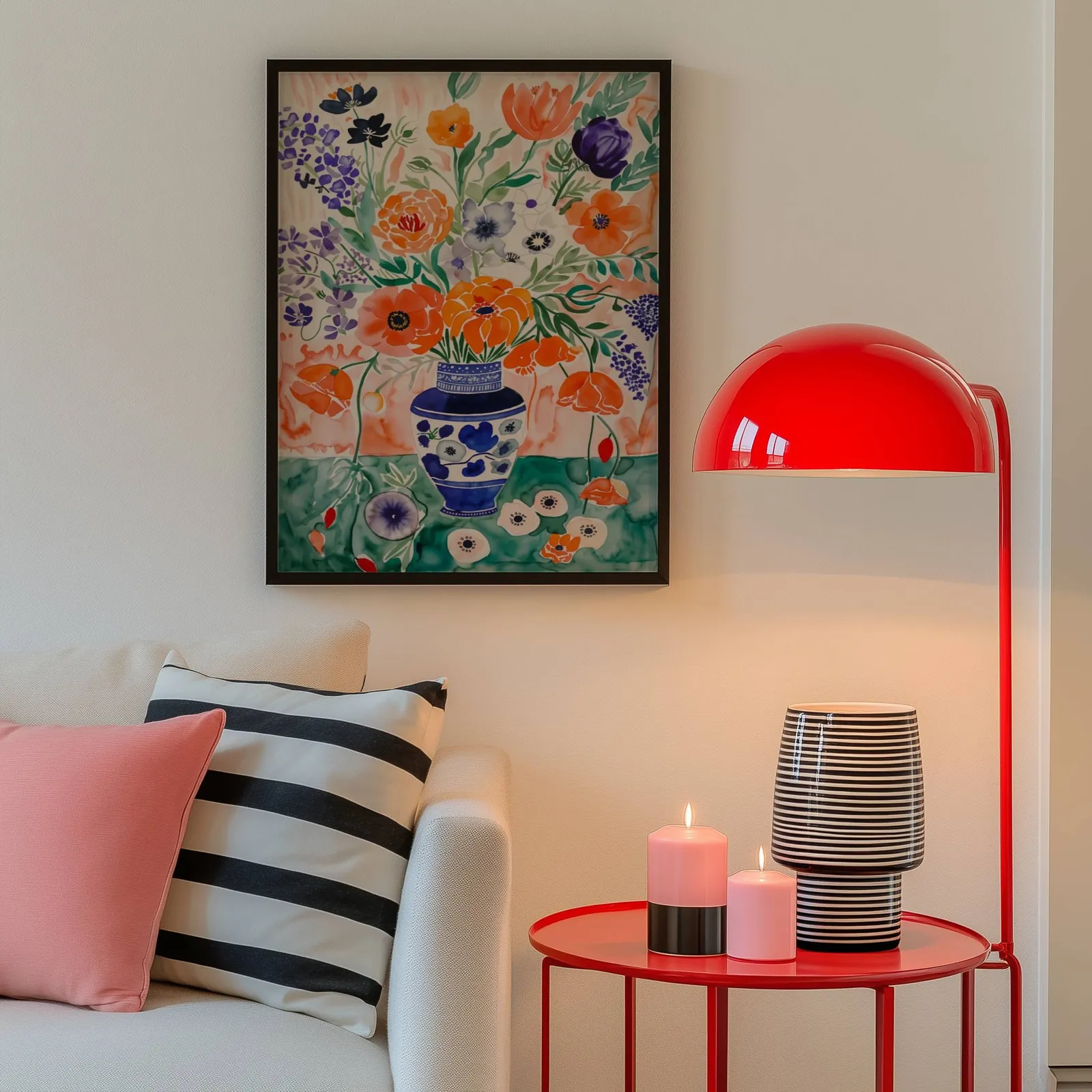 colorful floral wall art with blue vase, above a cream sofa beside a glossy red dome lamp