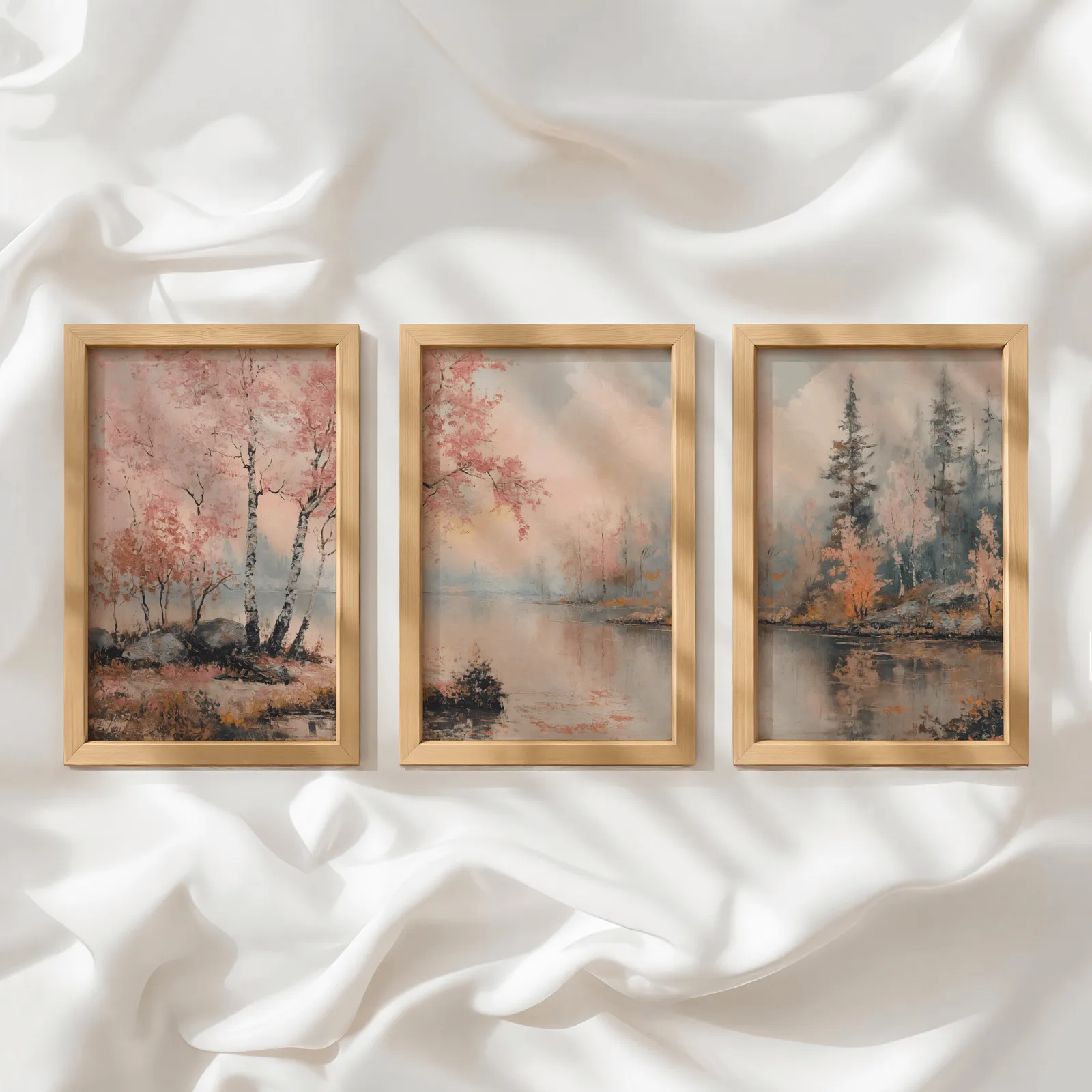 pink misty forest lakeside triptych wall art, in a row atop rumpled white silky fabric