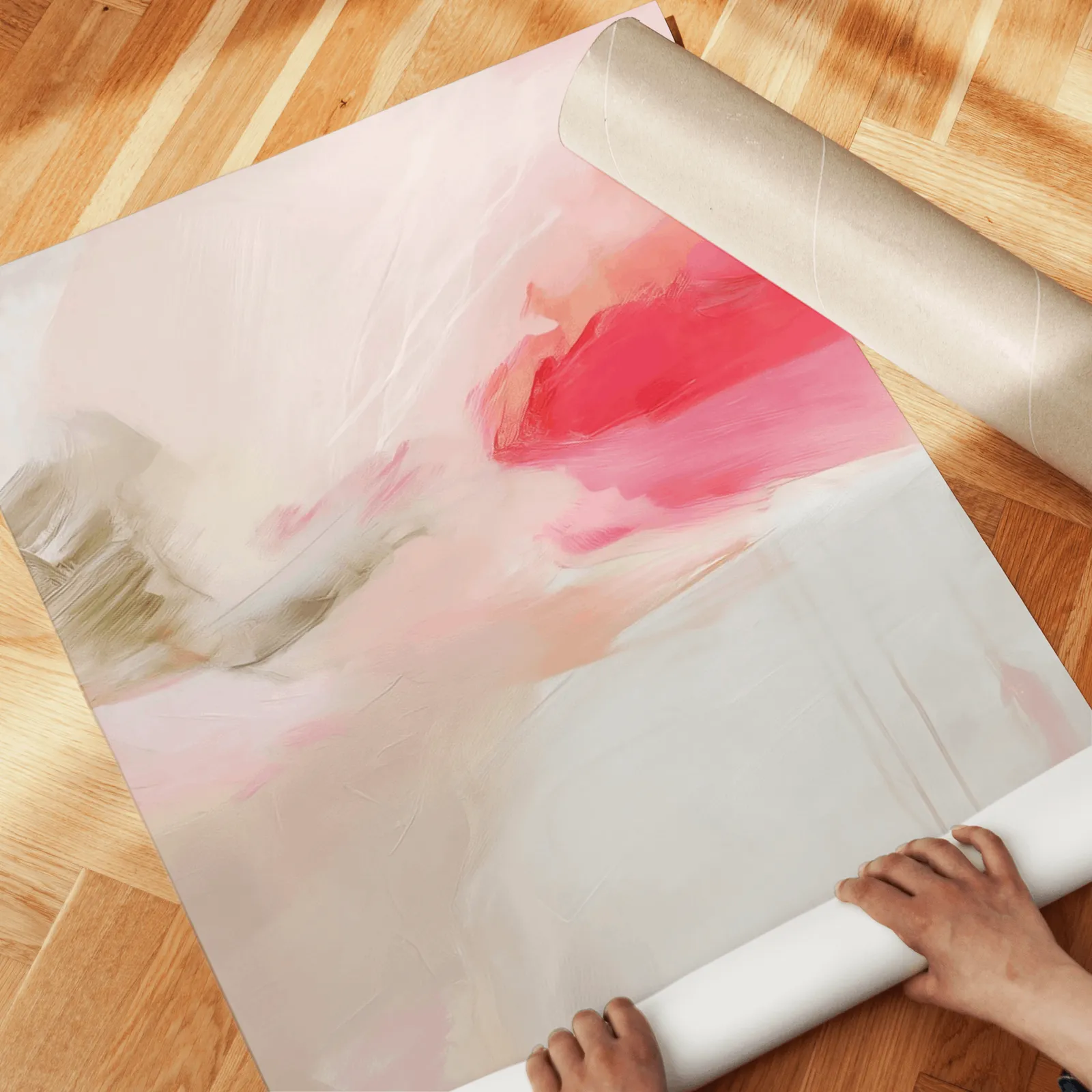 pink abstract set of 3 wall art, unrolled across a herringbone wood floor by hand