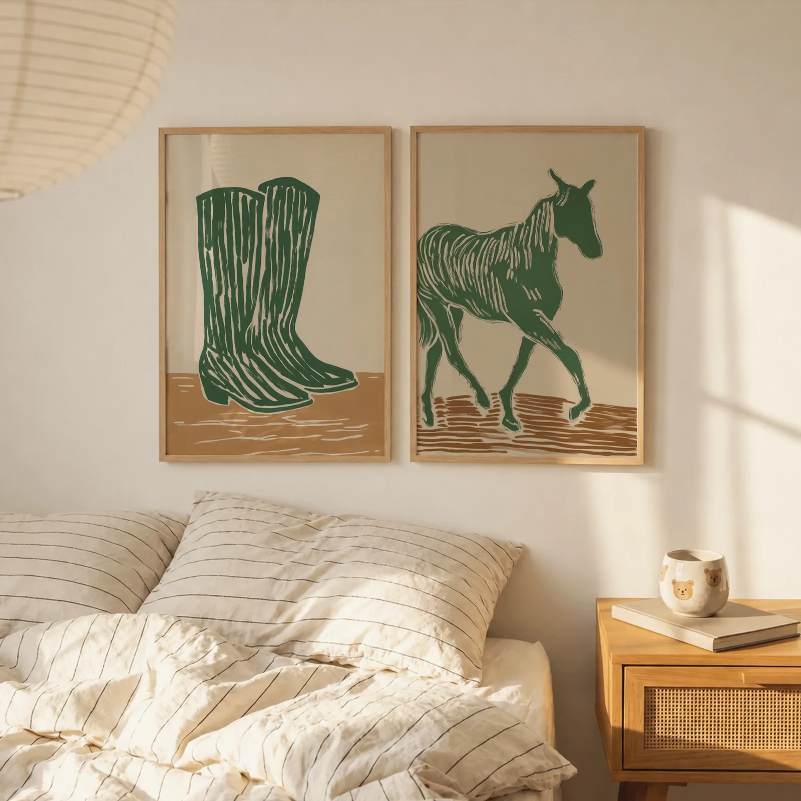 green western boots and horse wall art set, above a striped linen bed beside a paper lantern shade