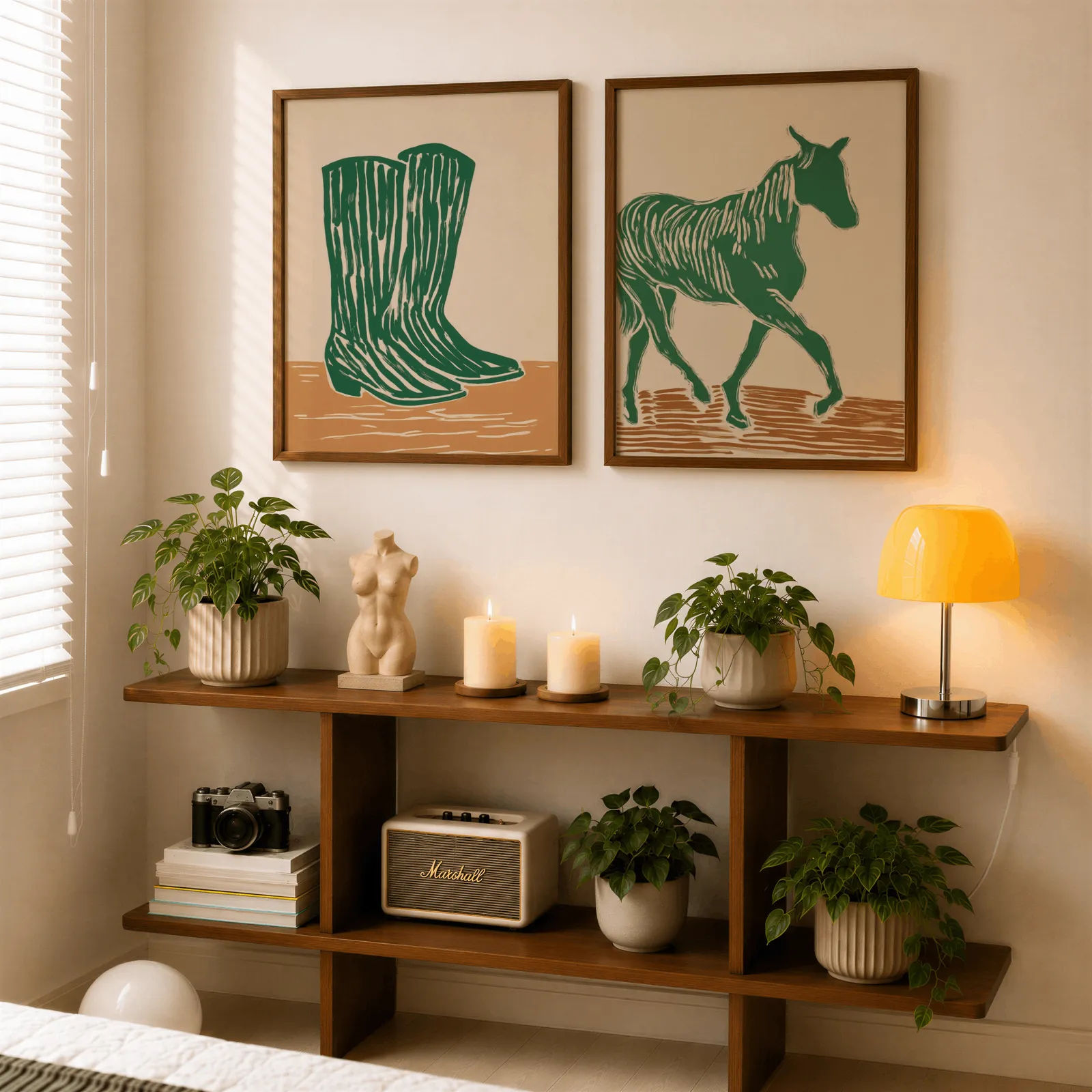 green western boots and horse wall art set, above a wooden console shelf with potted plants and a yellow lamp