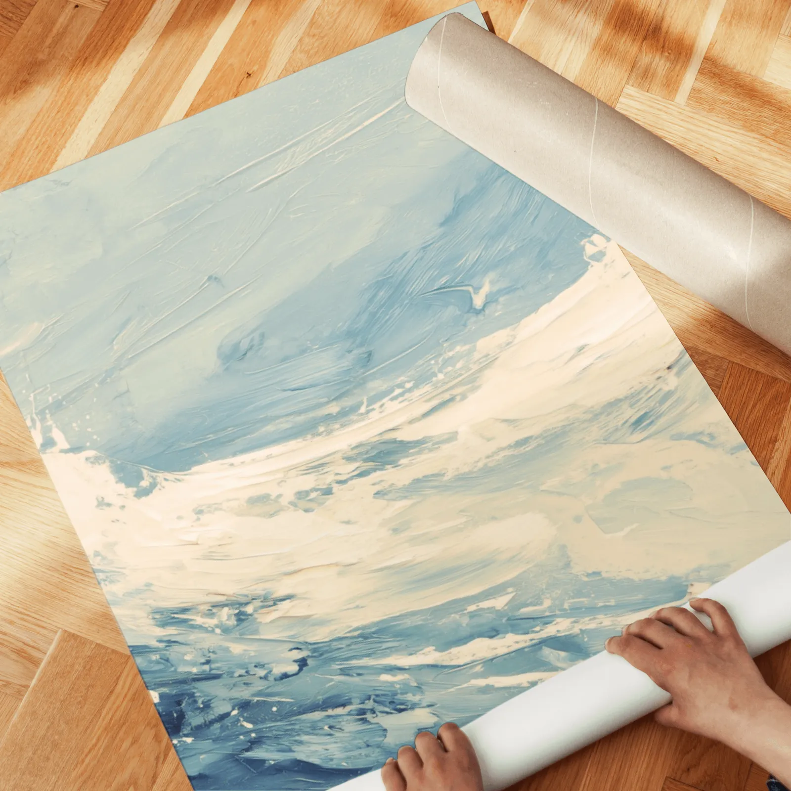 blue ocean wave abstract wall art set of two, unrolled across a herringbone parquet floor by hand