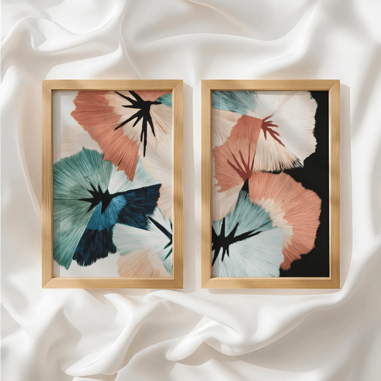 terracotta and teal abstract floral wall art set of two, side by side atop rumpled white silky fabric