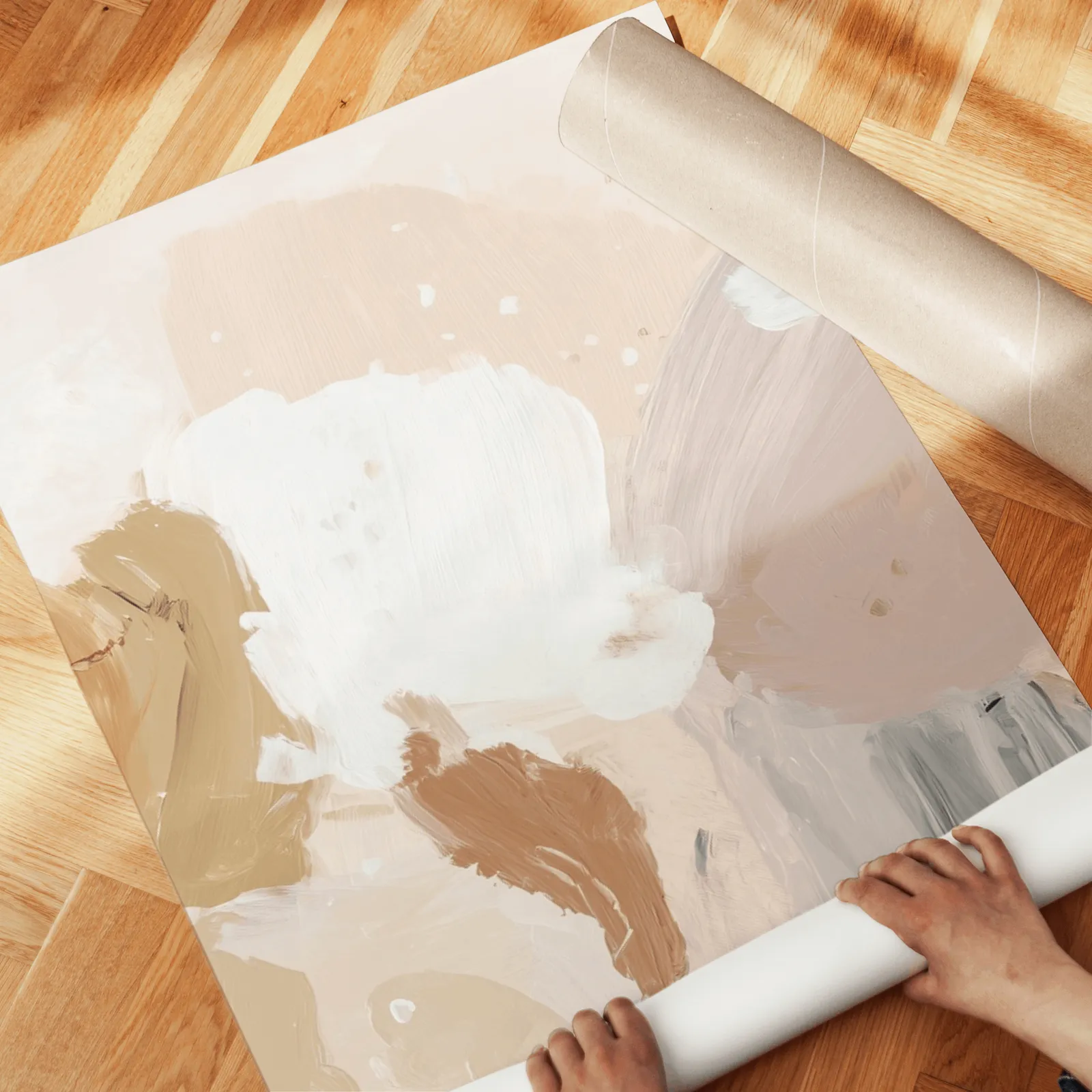 terracotta abstract wall art set of 3, unrolled across a herringbone wood floor by hand