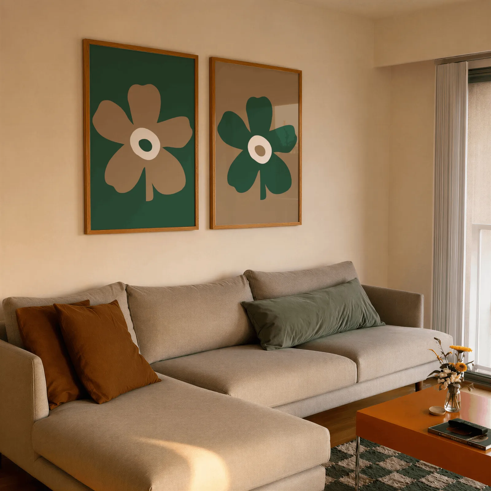 green and brown botanical flower wall art set of two, side by side above a beige sectional sofa