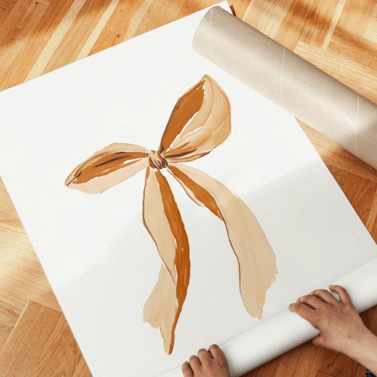 western cowgirl wall art set of three terracotta prints, unrolled across a herringbone wood floor by hand