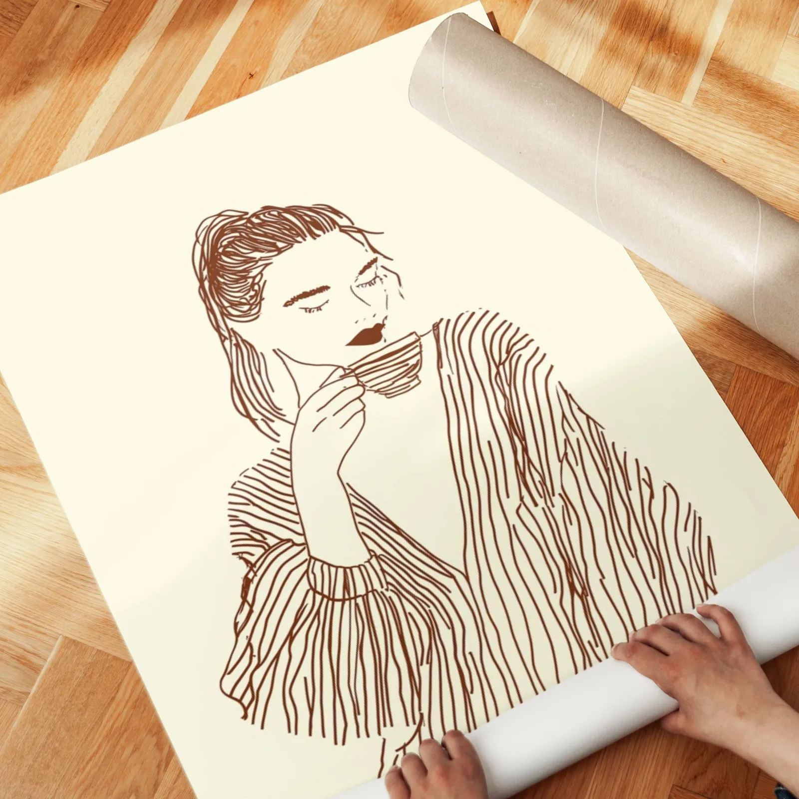 woman drinking coffee line art print, unrolled across a herringbone parquet floor by hand