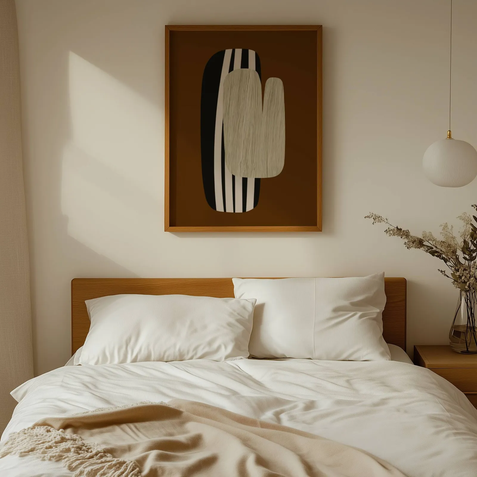 brown abstract wall art, above a wooden headboard with white linen pillows