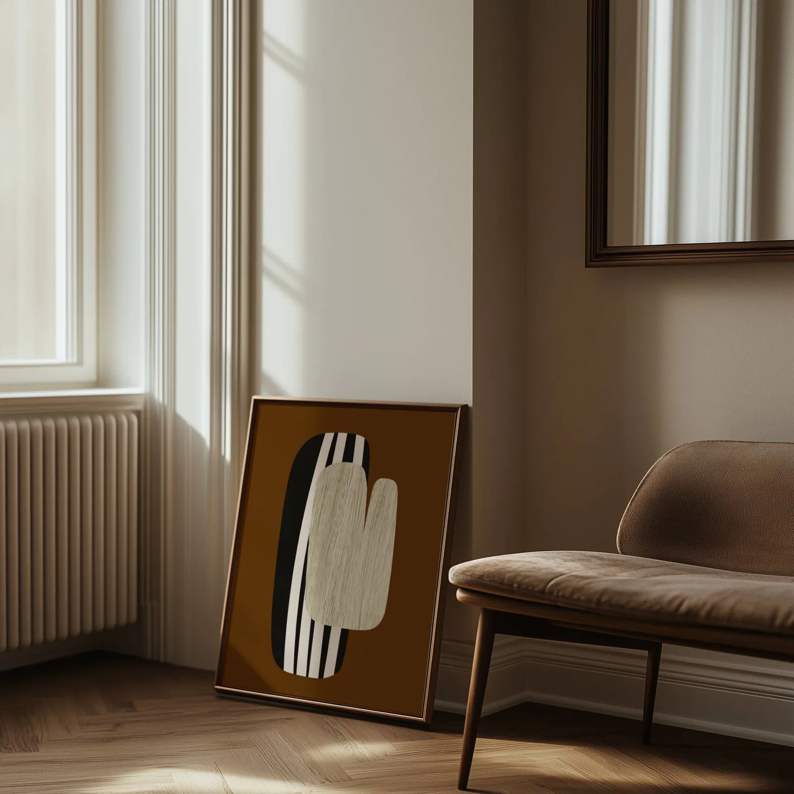 brown abstract wall art, leaning against the wall beside a sunlit radiator and herringbone floor