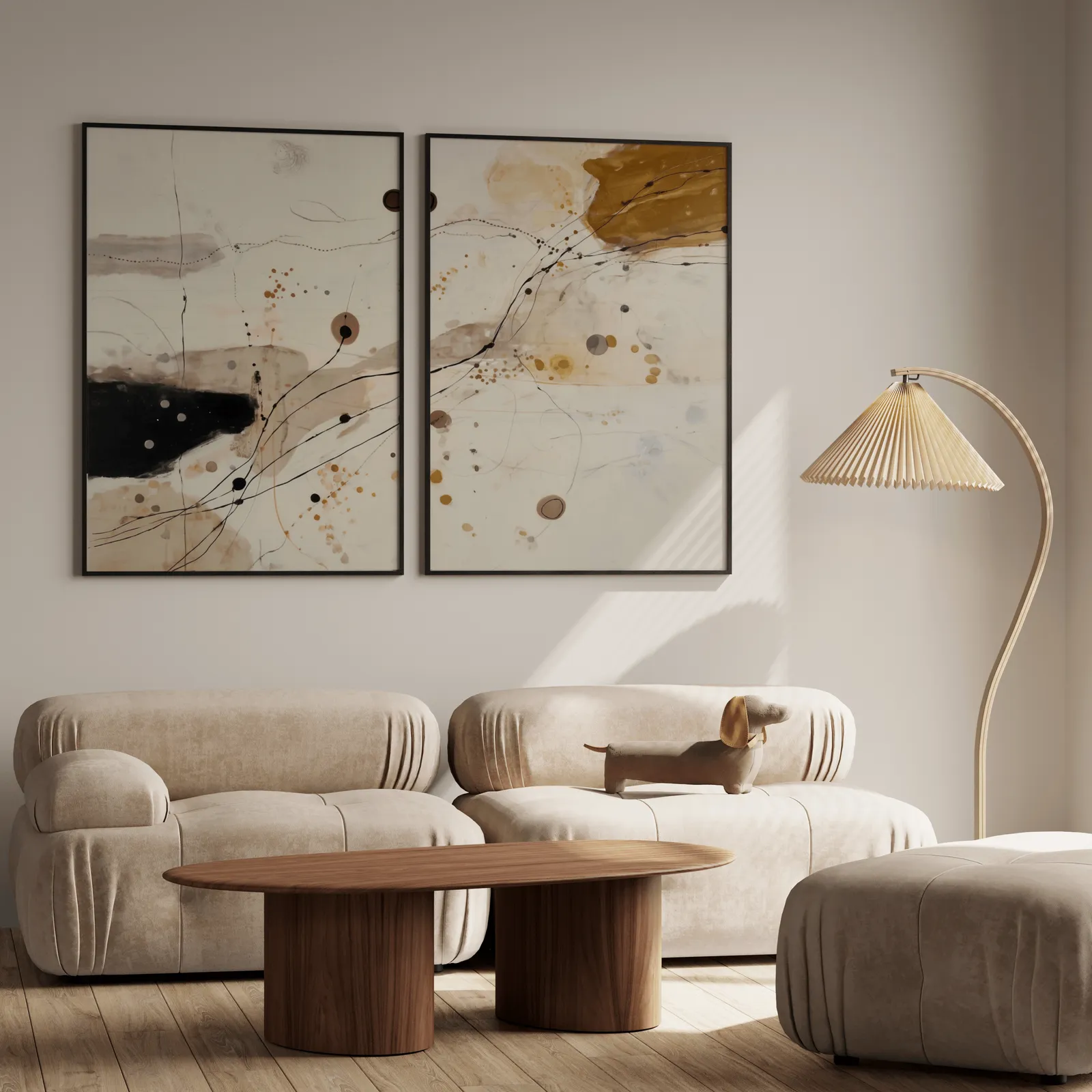 beige and ochre abstract wall art set of 2, above a plush beige sofa with a pleated lamp nearby