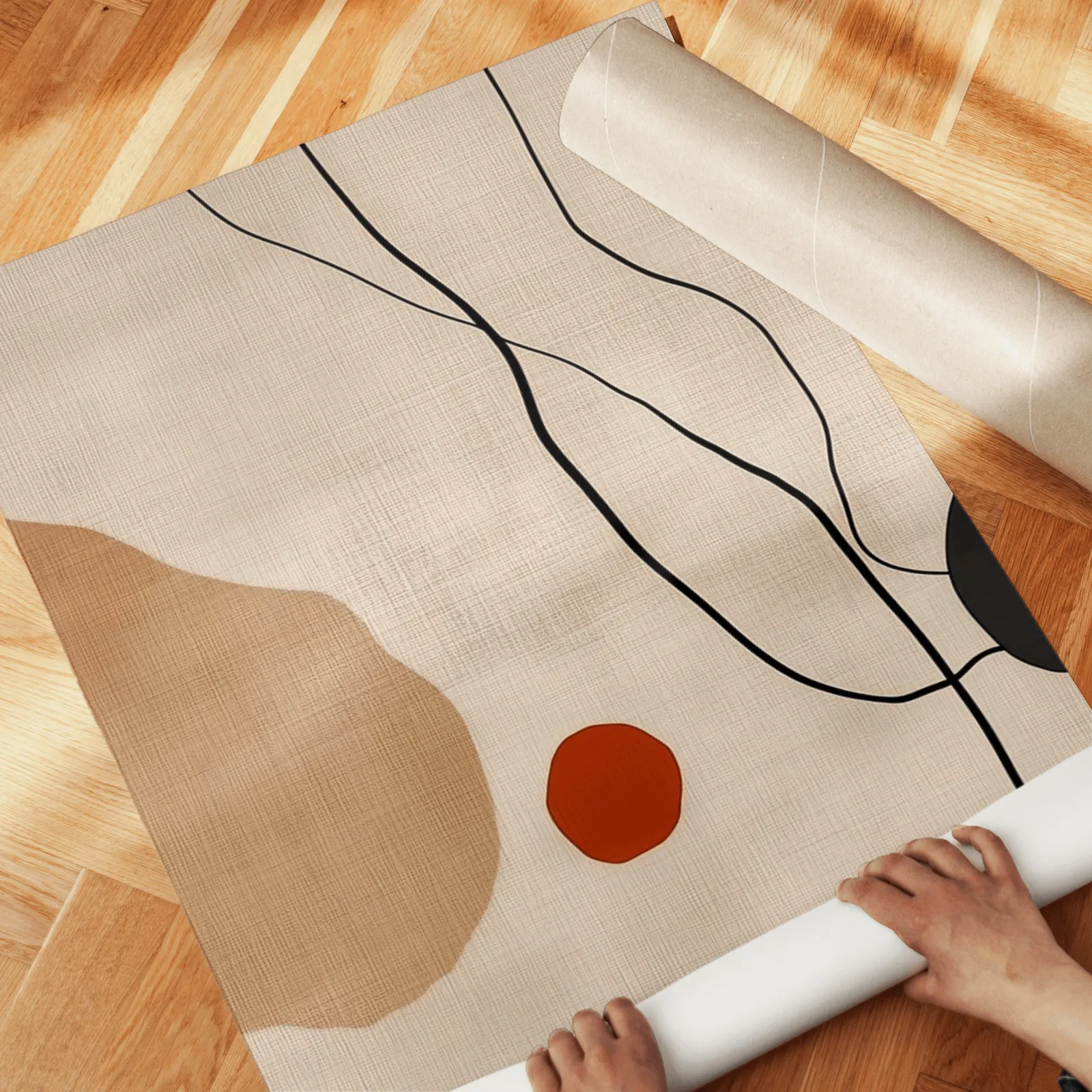 terracotta abstract minimalist wall art set of 3, unrolled across a herringbone wood floor by hand