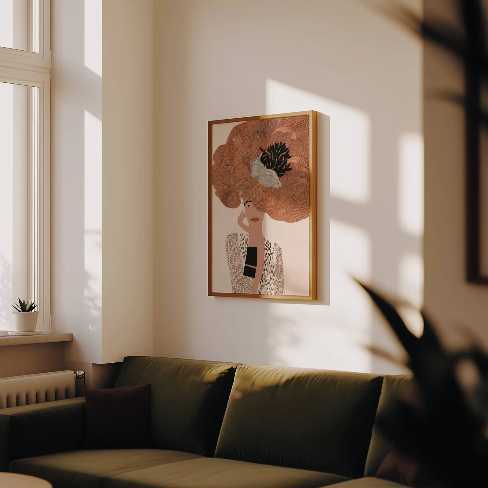 terracotta floral woman portrait wall art, above an olive velvet sofa in raking afternoon light