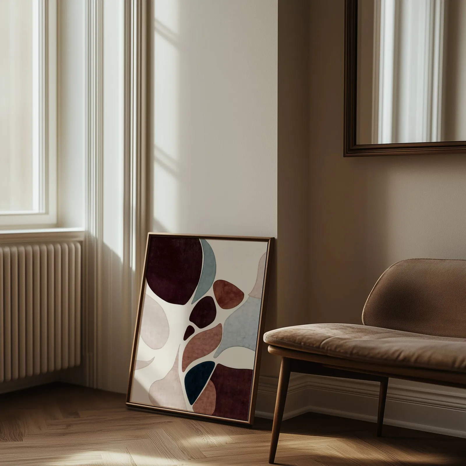 burgundy terracotta abstract organic shapes wall art, leaning against the wall beside a sunlit radiator and herringbone floor