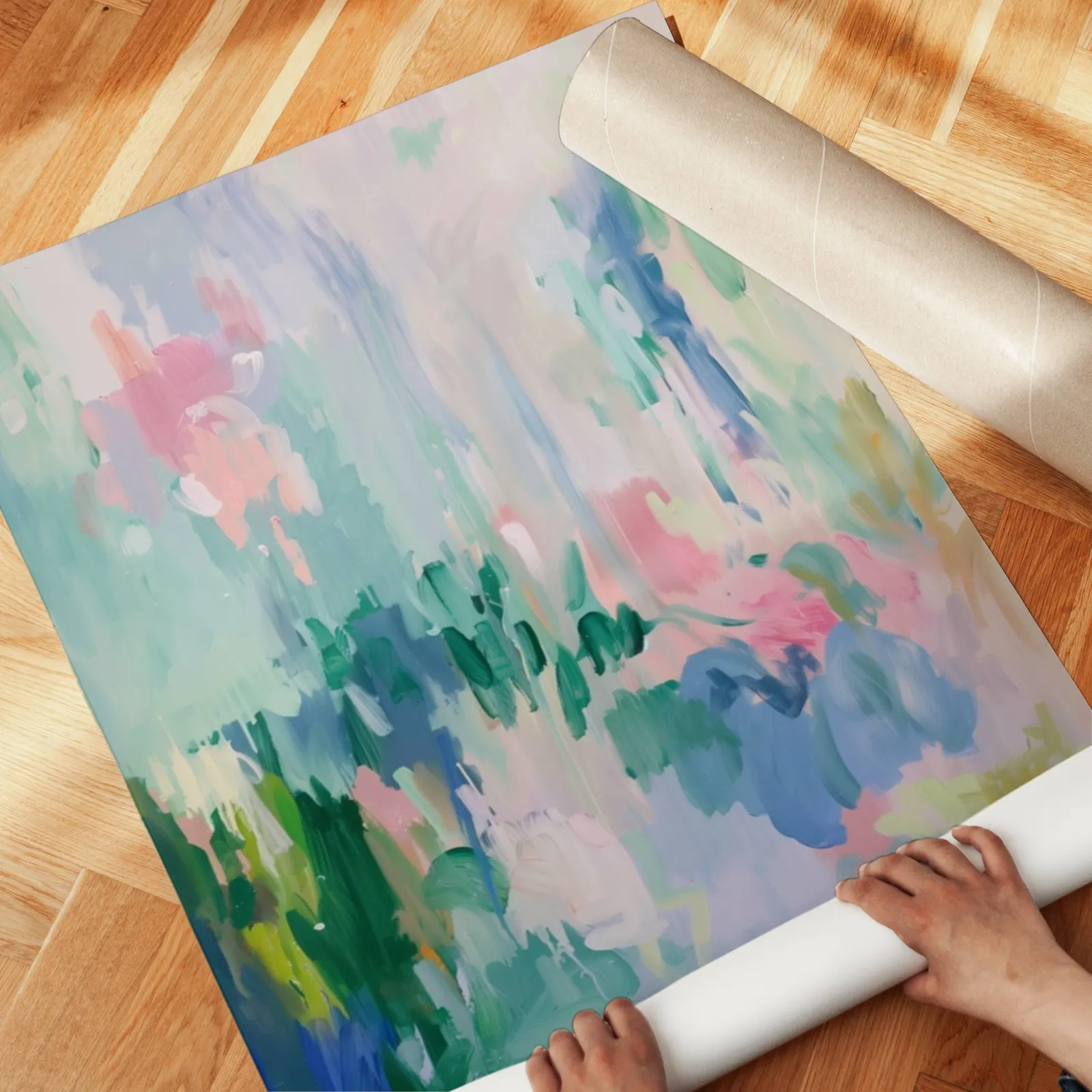 colorful abstract floral wall art in green and pink, unrolled across a herringbone parquet floor by hand