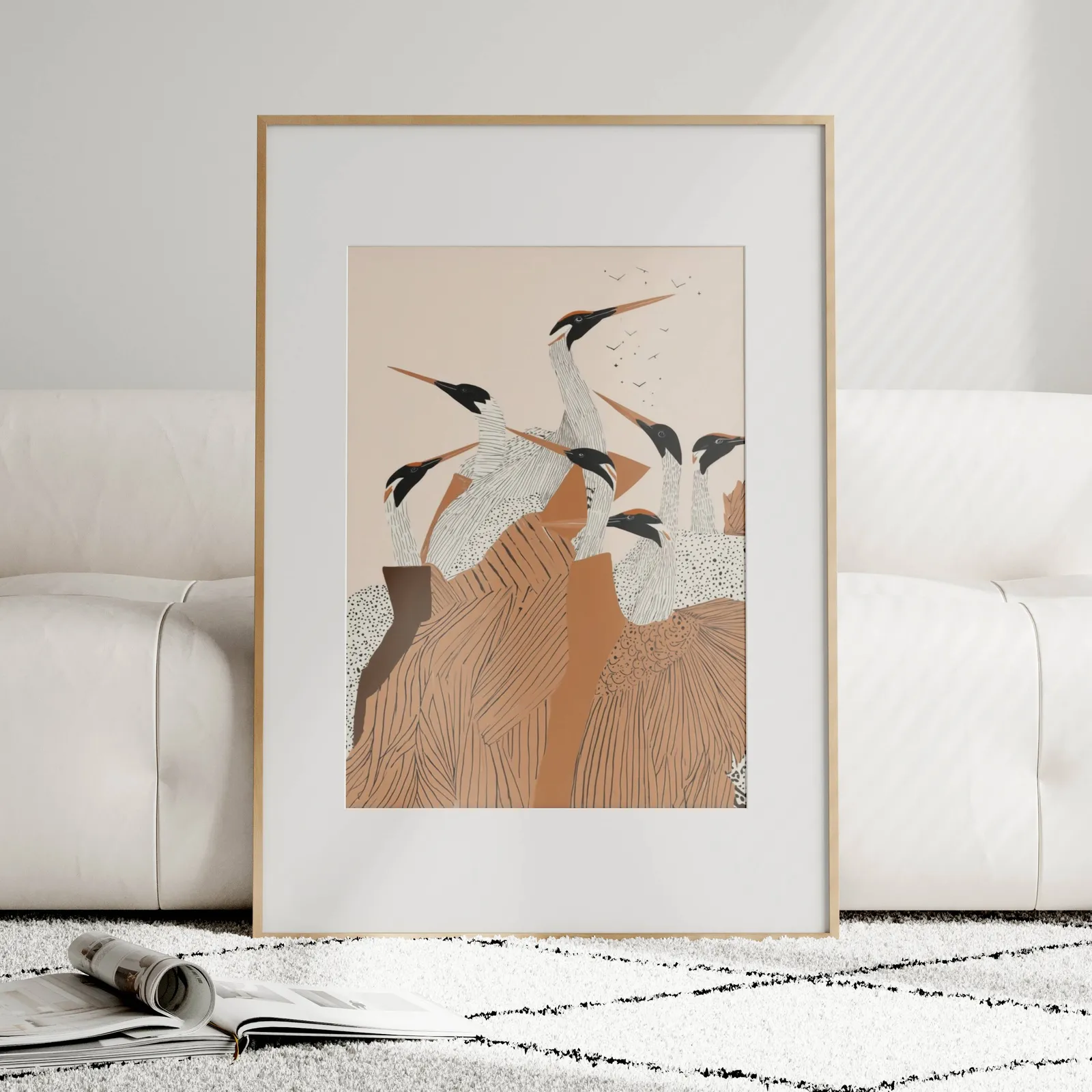 terracotta crane flock nature wall art, leaning against a plush cream sofa on a patterned rug