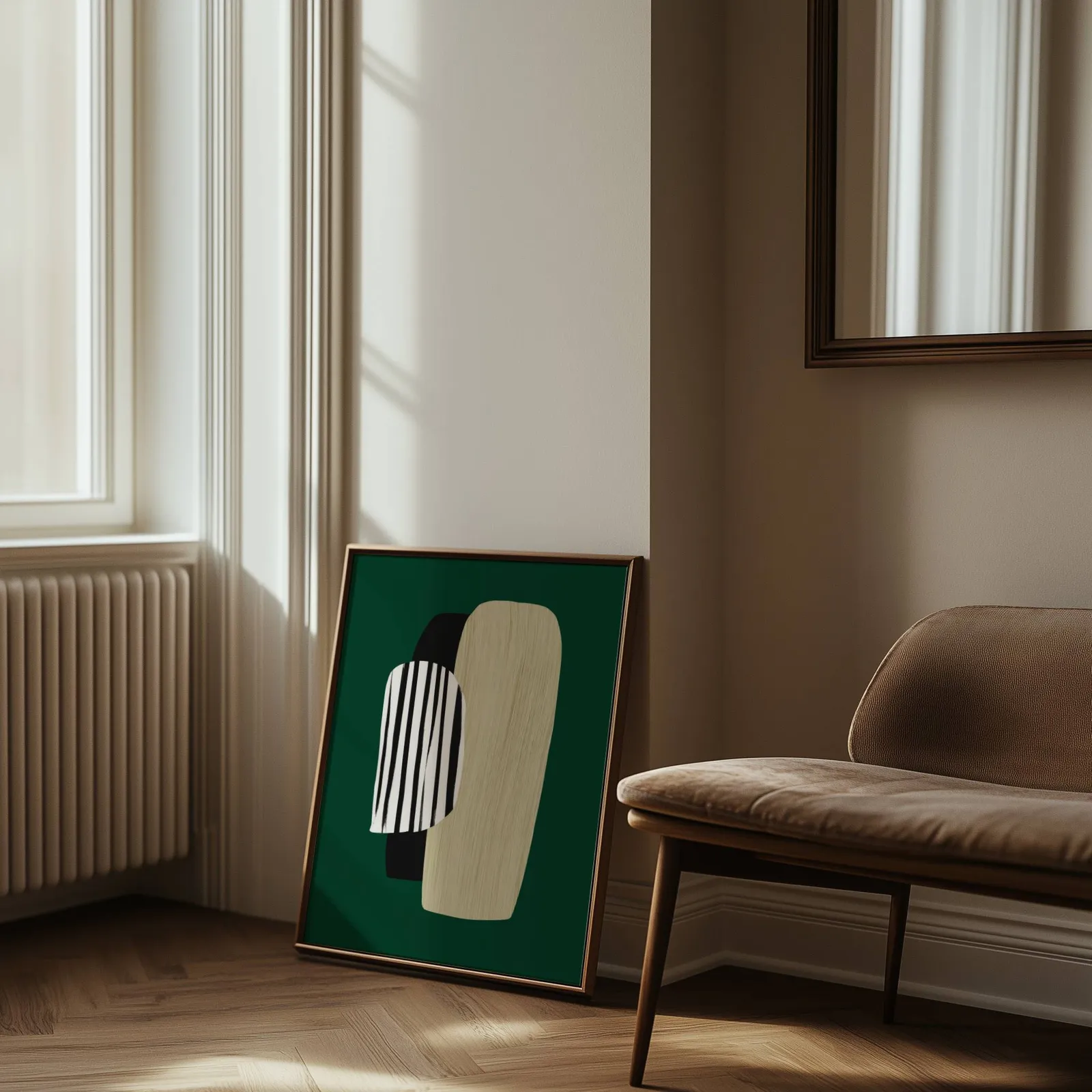 green abstract minimalist wall art with totem shapes, leaning against the wall beside a sunlit radiator and herringbone floor