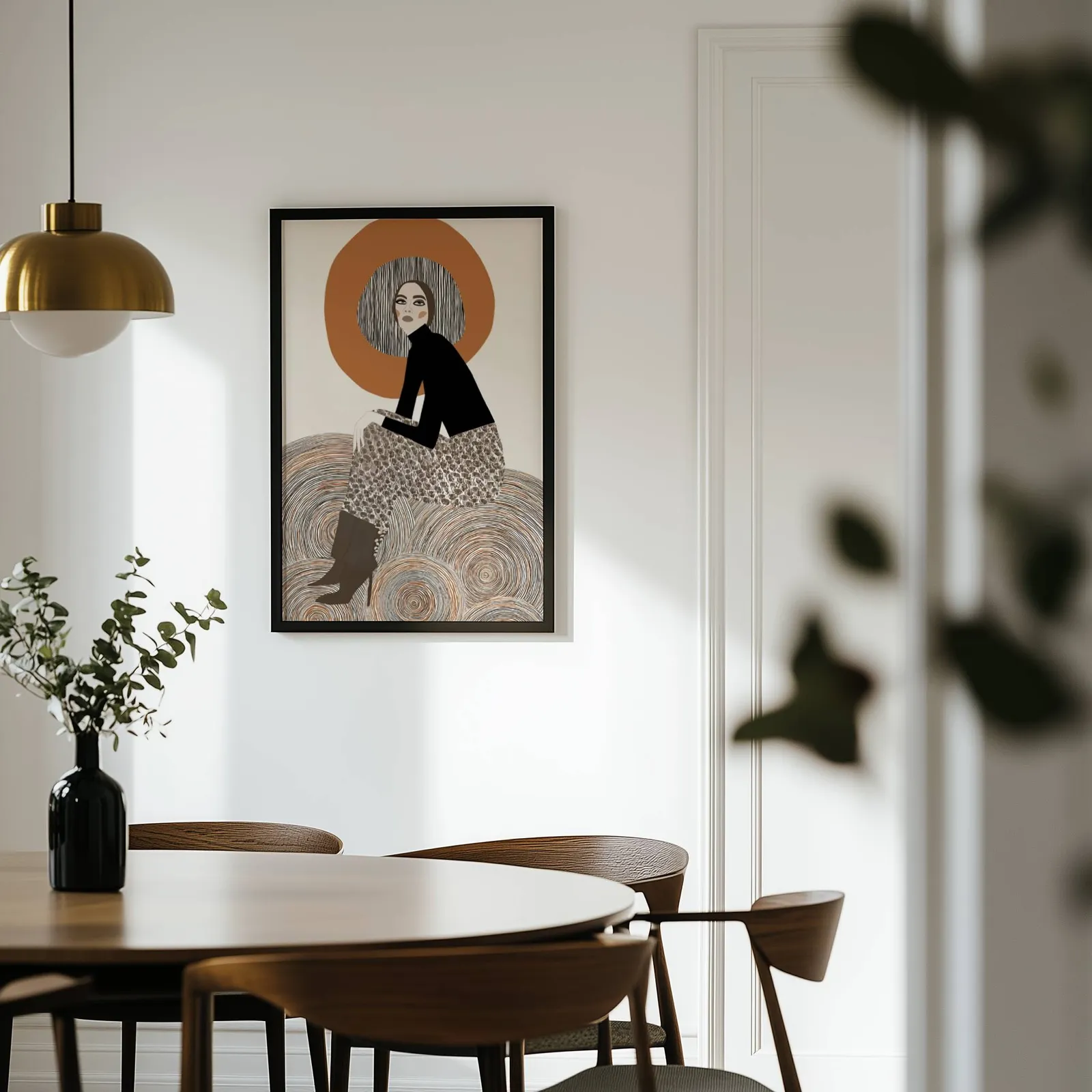 terracotta abstract woman wall art, on a white wall above a round wooden dining table