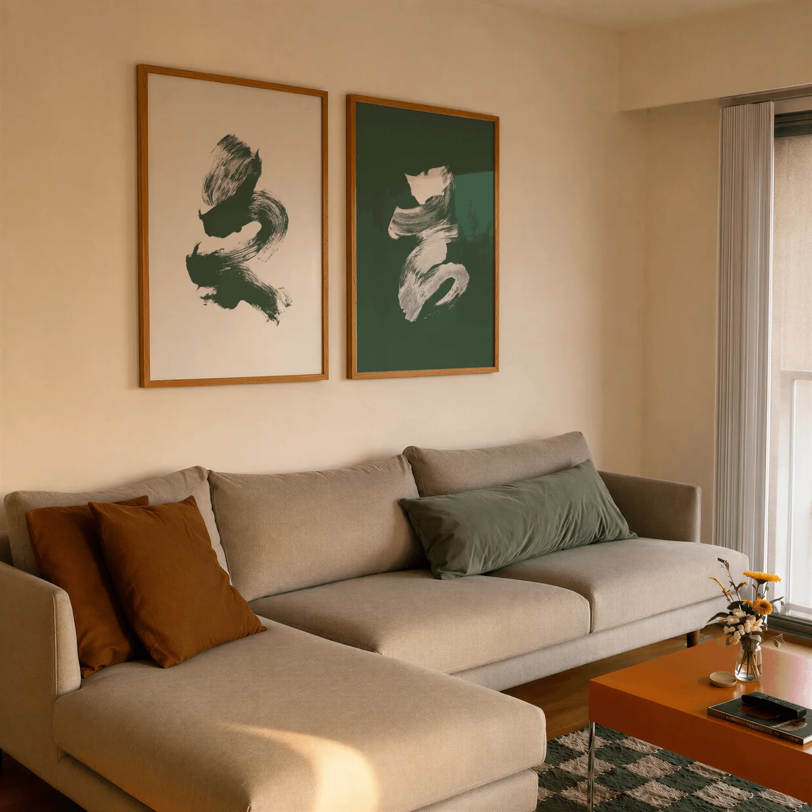 green and cream abstract brushstroke wall art set of 2, side by side above a beige sectional sofa