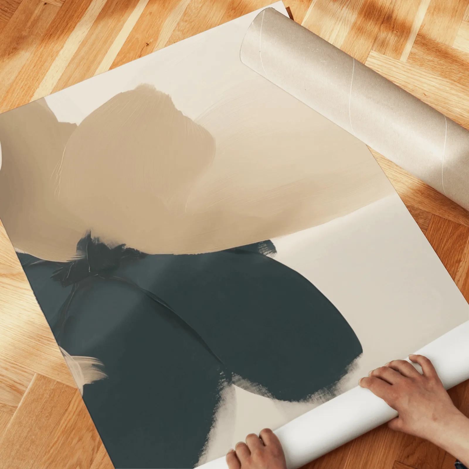 beige and black abstract floral wall art set of 2, unrolled across a herringbone parquet floor by hand