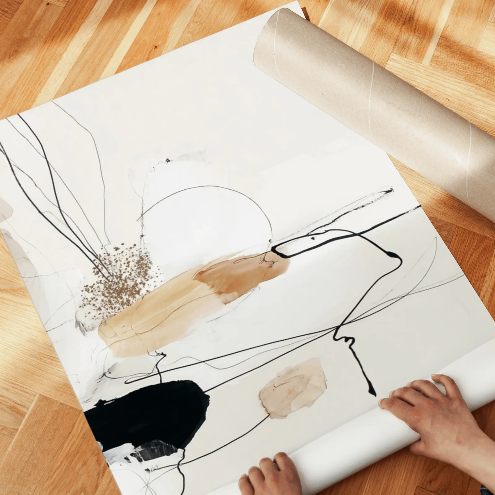 beige abstract minimalist wall art set of two, unrolled across a herringbone parquet floor by hand