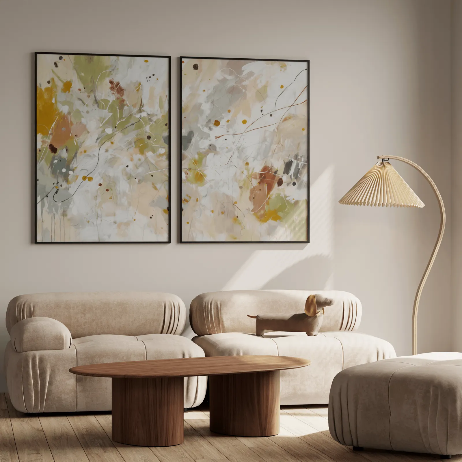 colorful abstract wall art set of two, above a plush beige sofa with a pleated lamp nearby