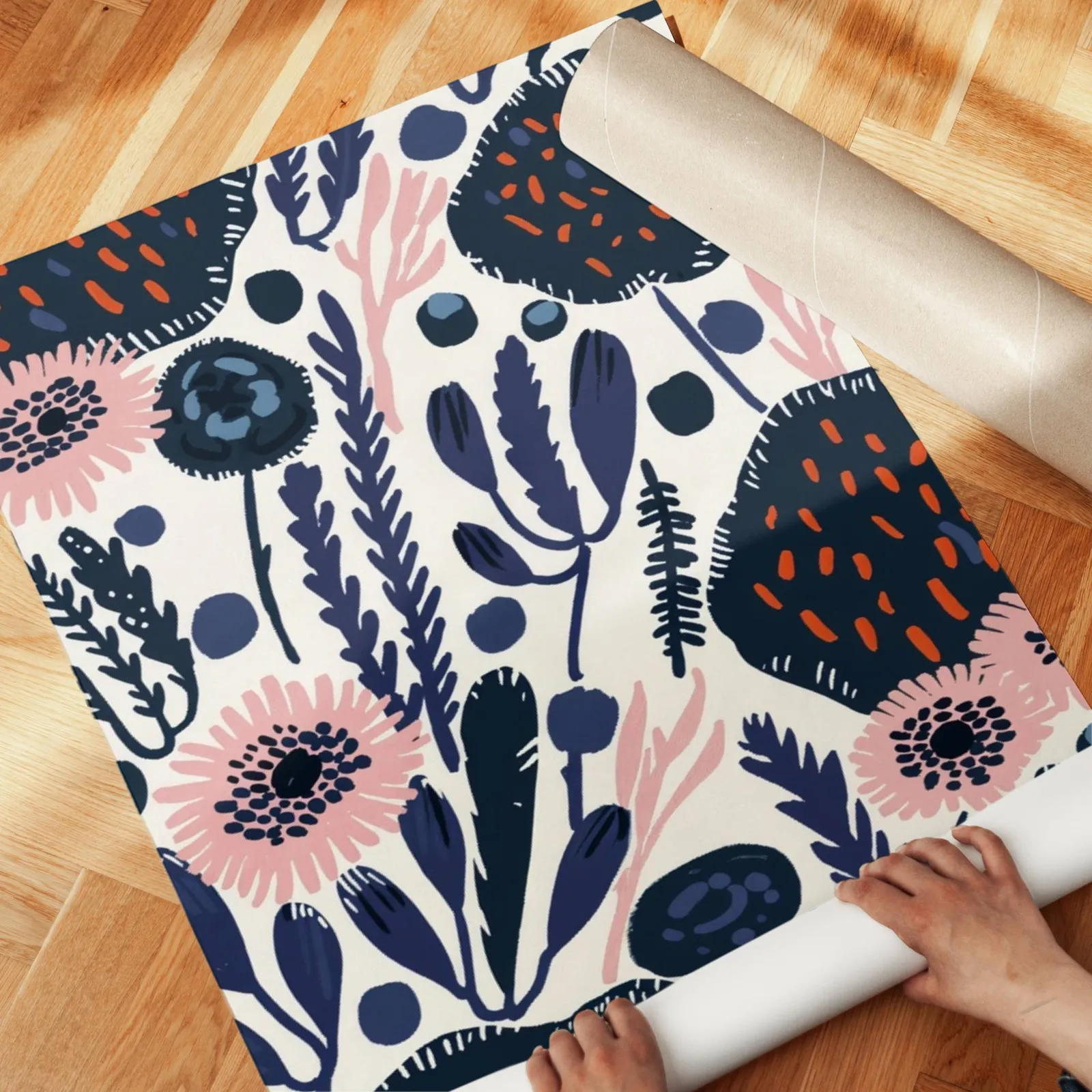 navy blue floral botanical wall art, unrolled across a herringbone parquet floor by hand