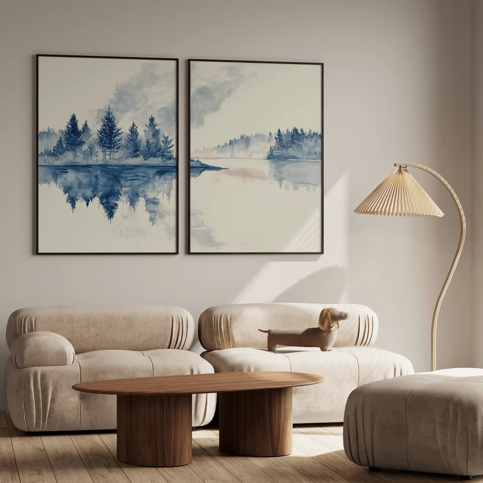 blue misty forest lake wall art set of 2, above a plush beige sofa with a pleated lamp nearby