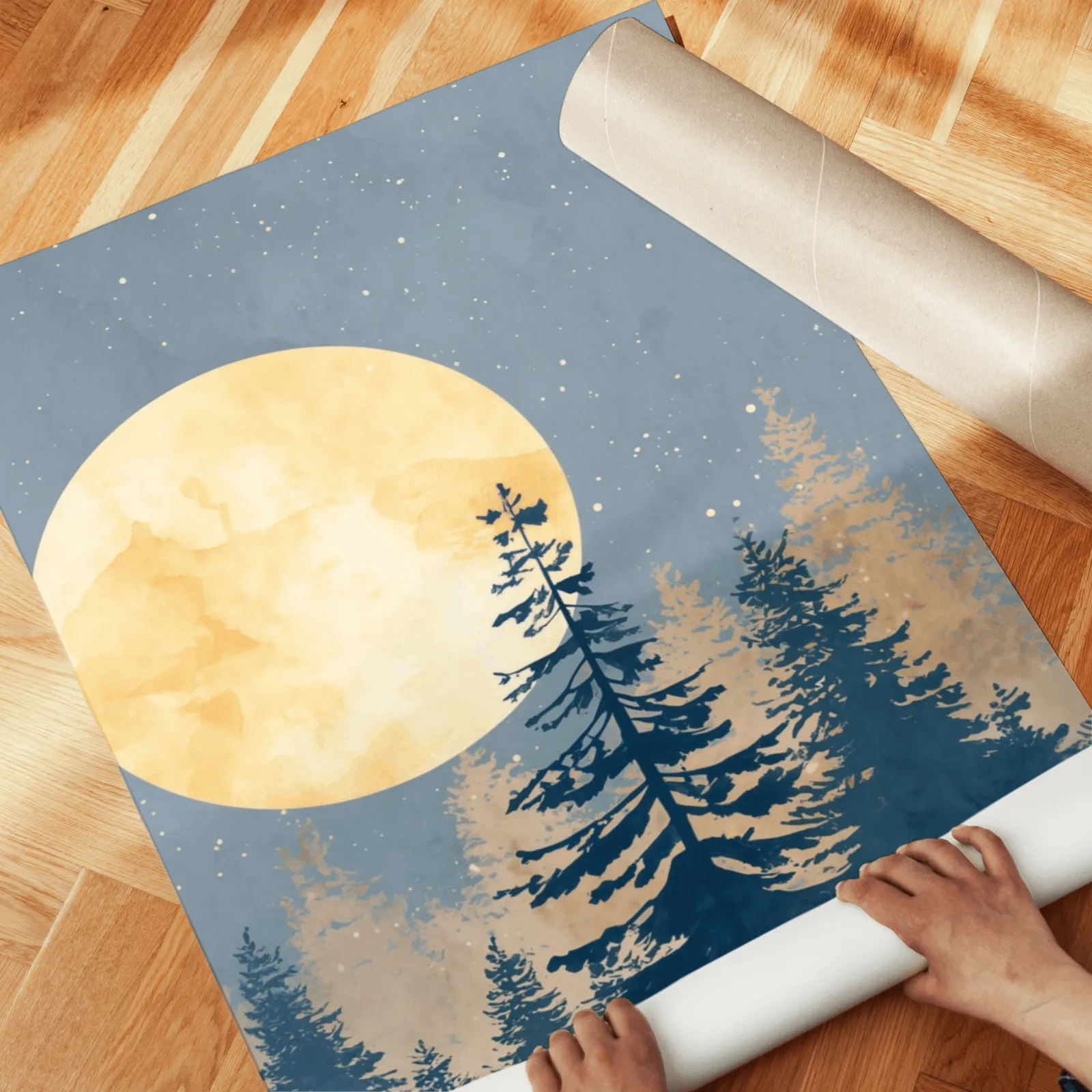 blue pine tree wall art set with golden moon, unrolled across a herringbone parquet floor by hand