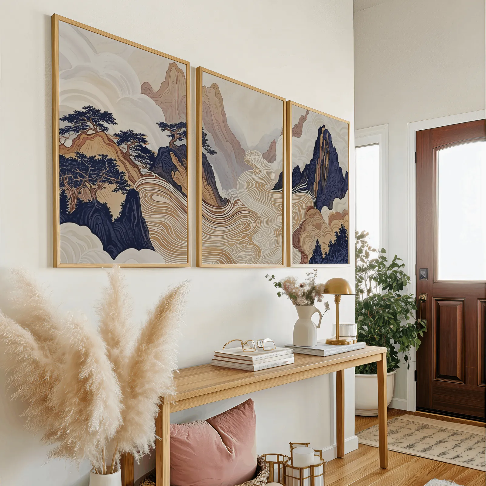 japandi mountain landscape triptych wall art, above a wooden console table near the entry door