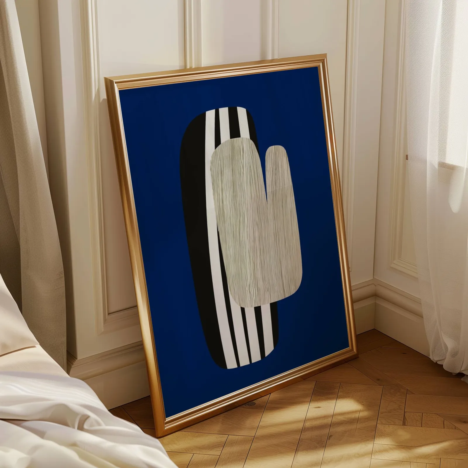 navy blue abstract wall art, leaning in a sunlit corner beside sheer curtains and herringbone floor