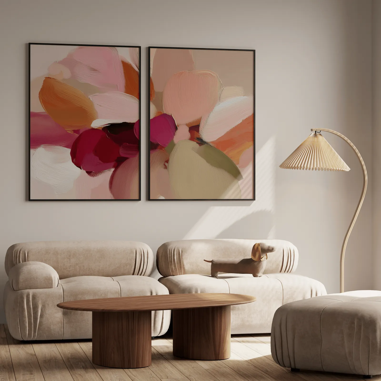 pink and orange abstract floral wall art set of 2, above a plush beige sofa with a pleated lamp nearby