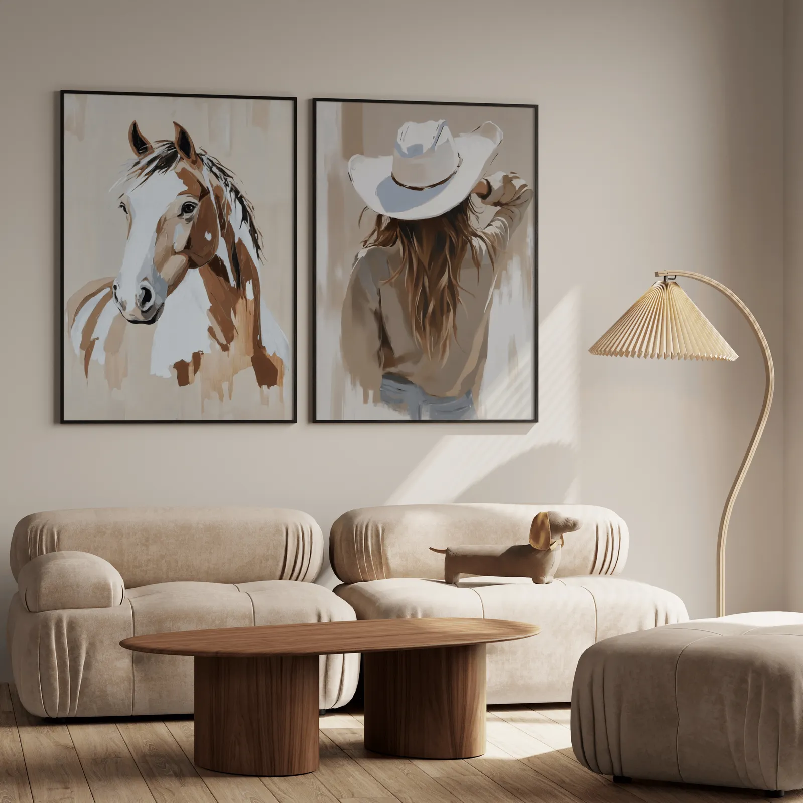 brown beige western horse and cowgirl wall art set of 2, above a plush beige sofa with a pleated lamp nearby