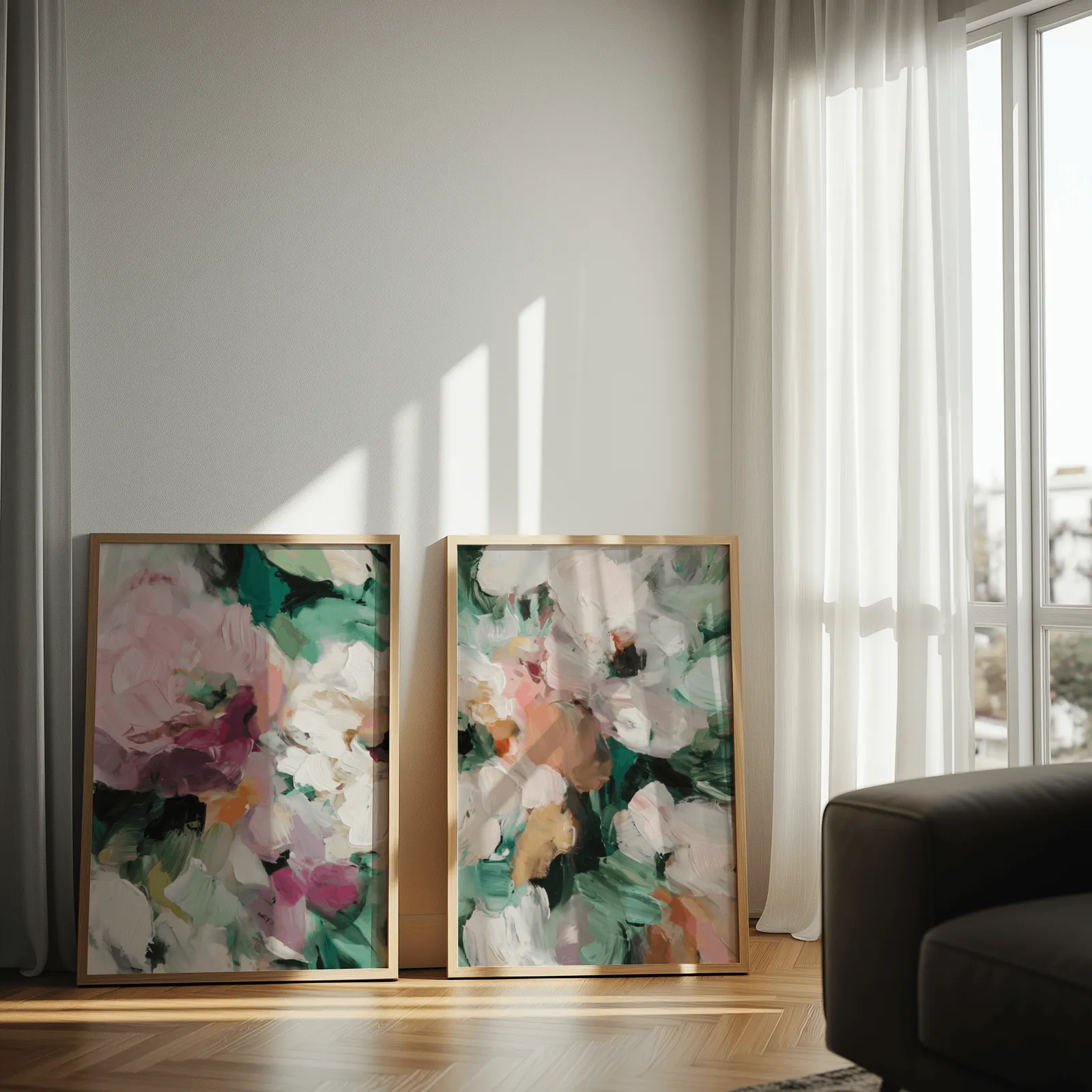pink and green abstract floral wall art set of two, leaning against a sunlit wall by sheer curtains