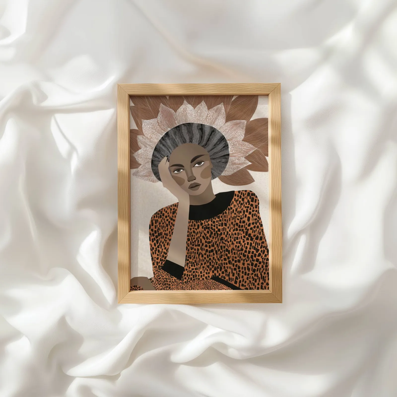 terracotta abstract woman portrait wall art with petal crown, resting atop rumpled white silky fabric