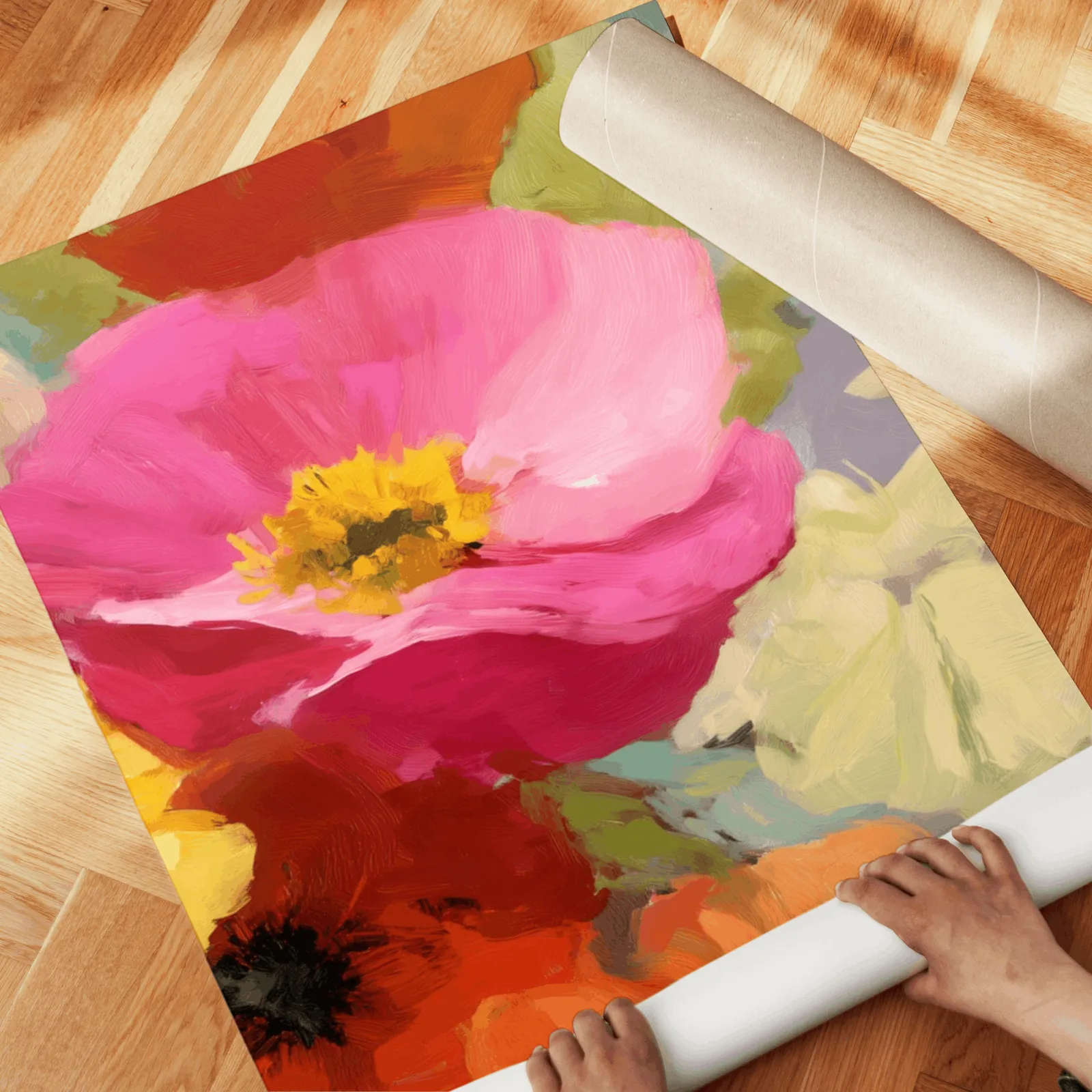 colorful floral wall art set of two, unrolled across a herringbone parquet floor by hand