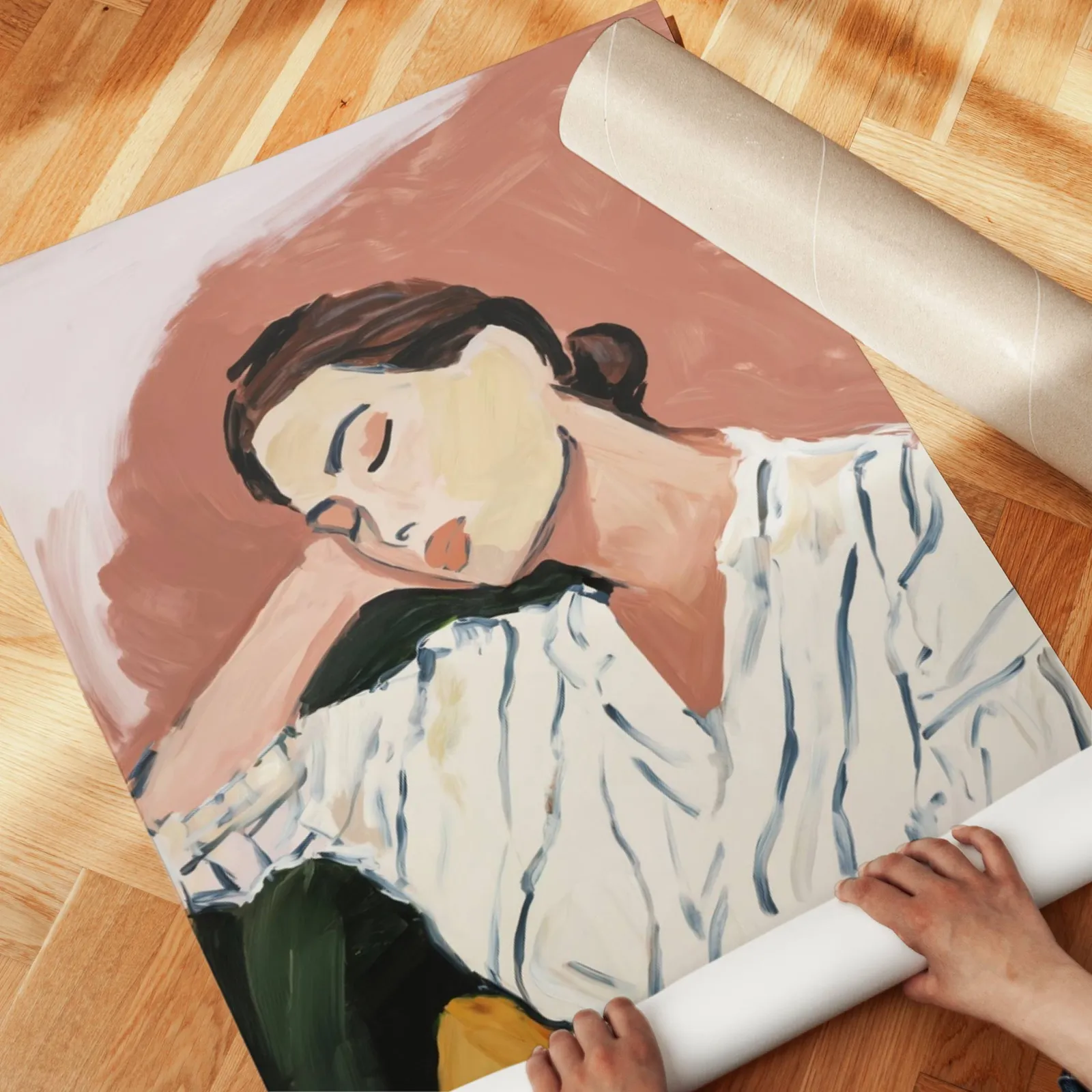 terracotta abstract portrait wall art of resting woman, unrolled across a herringbone parquet floor by hand