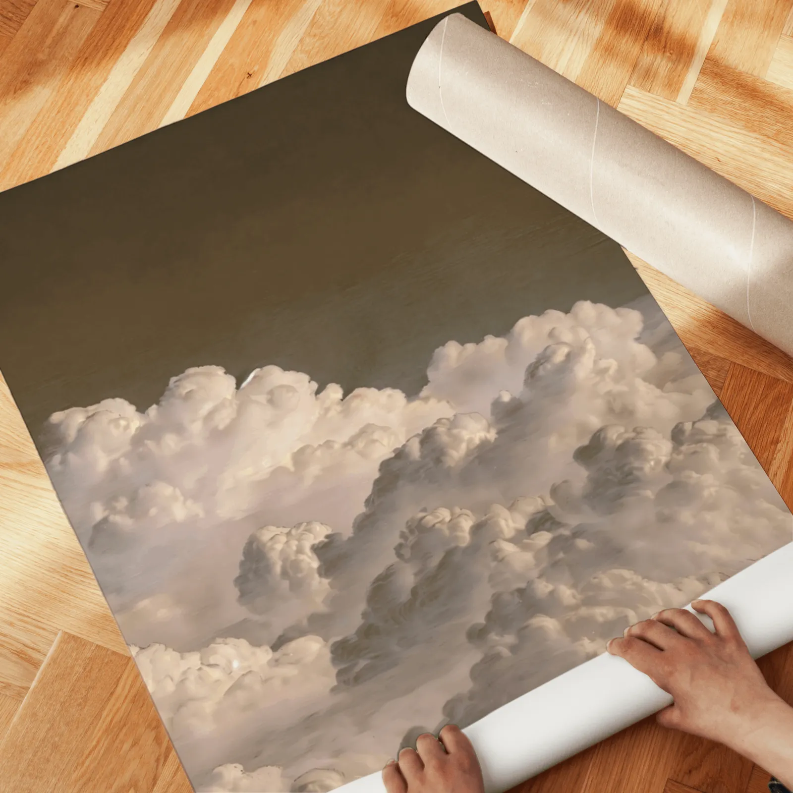 moody cloud landscape wall art set of 2, unrolled across a herringbone parquet floor by hand
