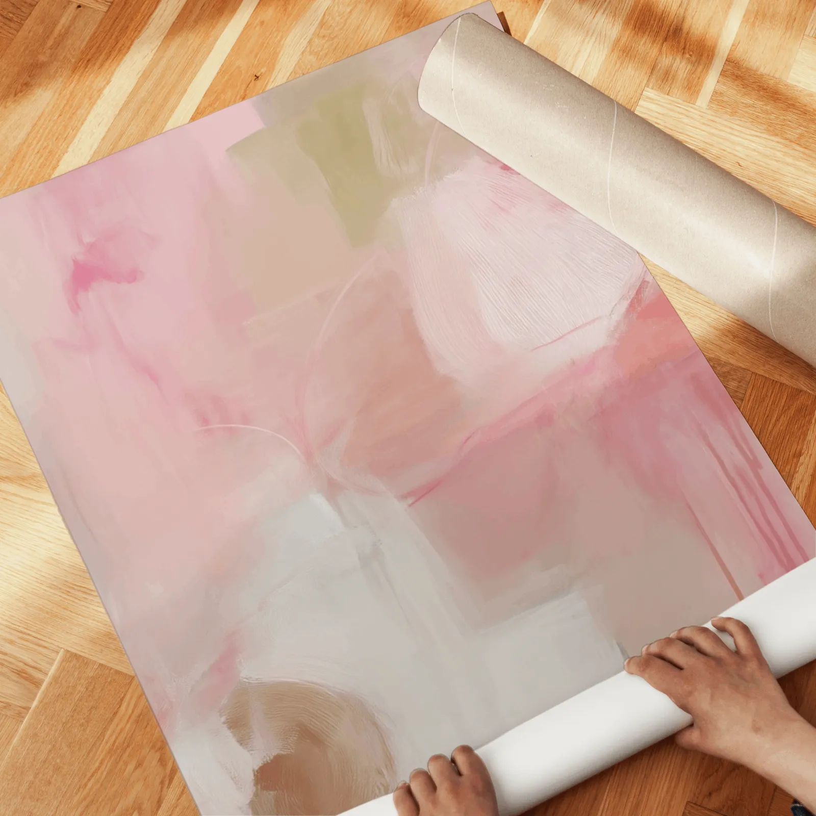 pink abstract triptych wall art, unrolled across a herringbone wood floor by hand