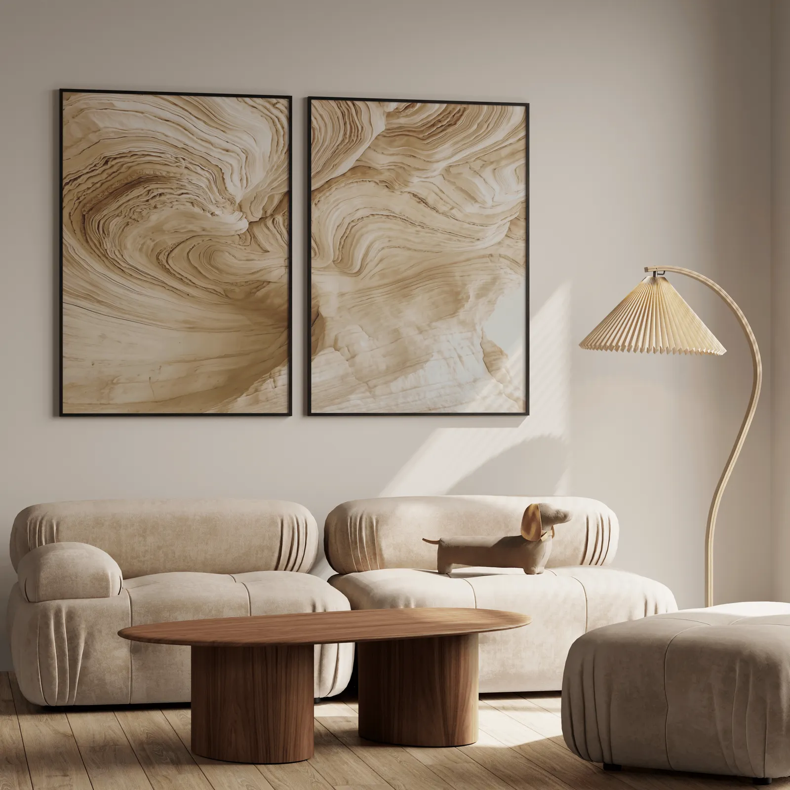 beige abstract nature wall art set of 2, above a plush beige sofa with a pleated lamp nearby