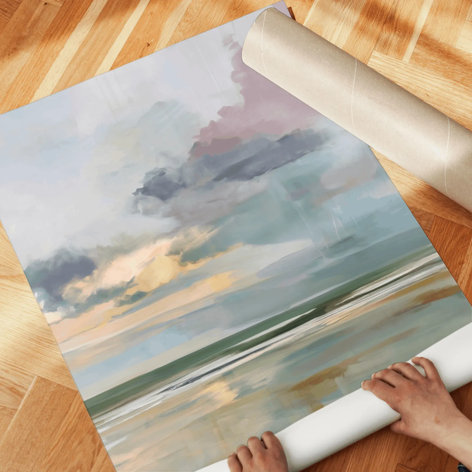 coastal sky wall art set of 2, unrolled across a herringbone parquet floor by hand