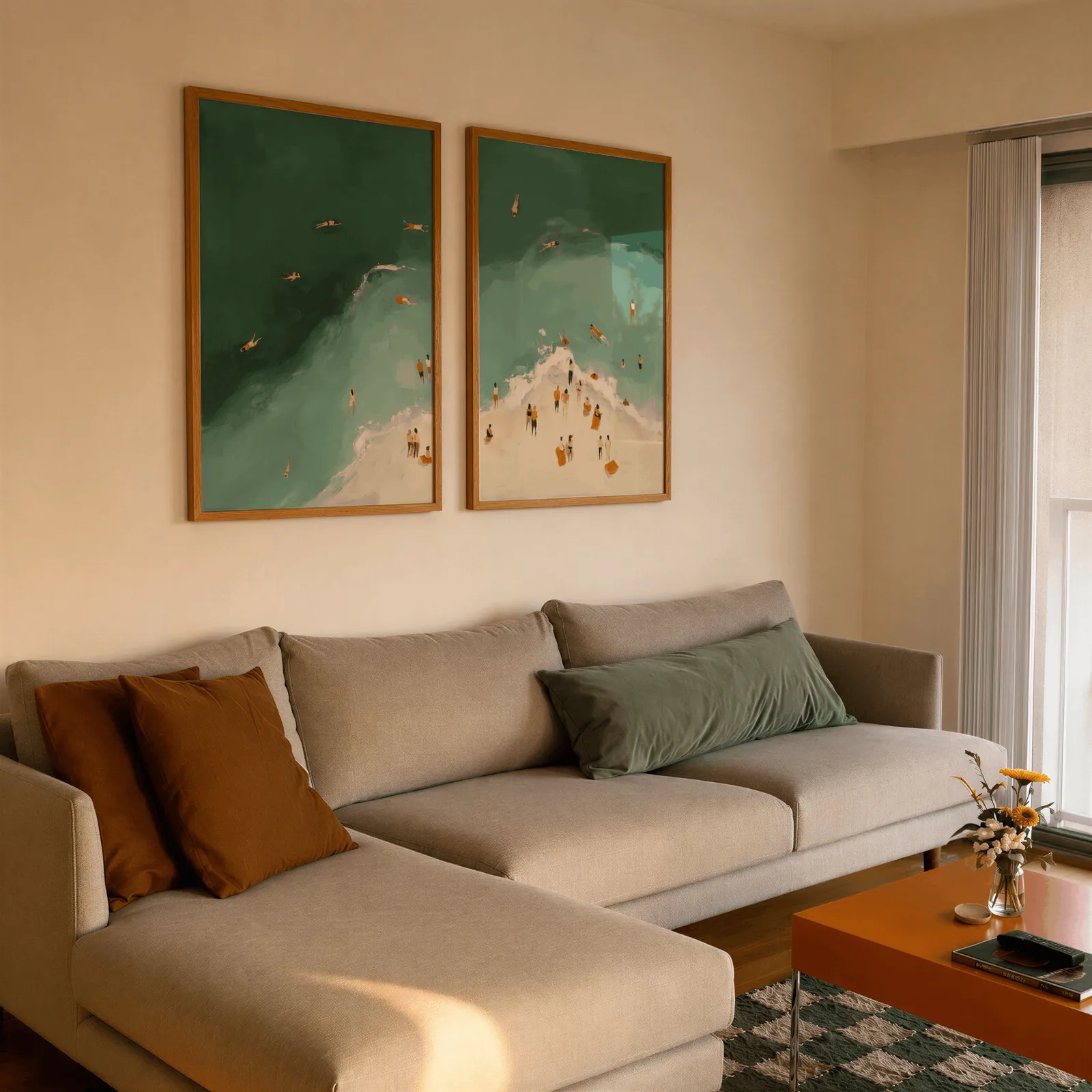 green coastal beach wall art set of two with swimmers, side by side above a beige sectional sofa