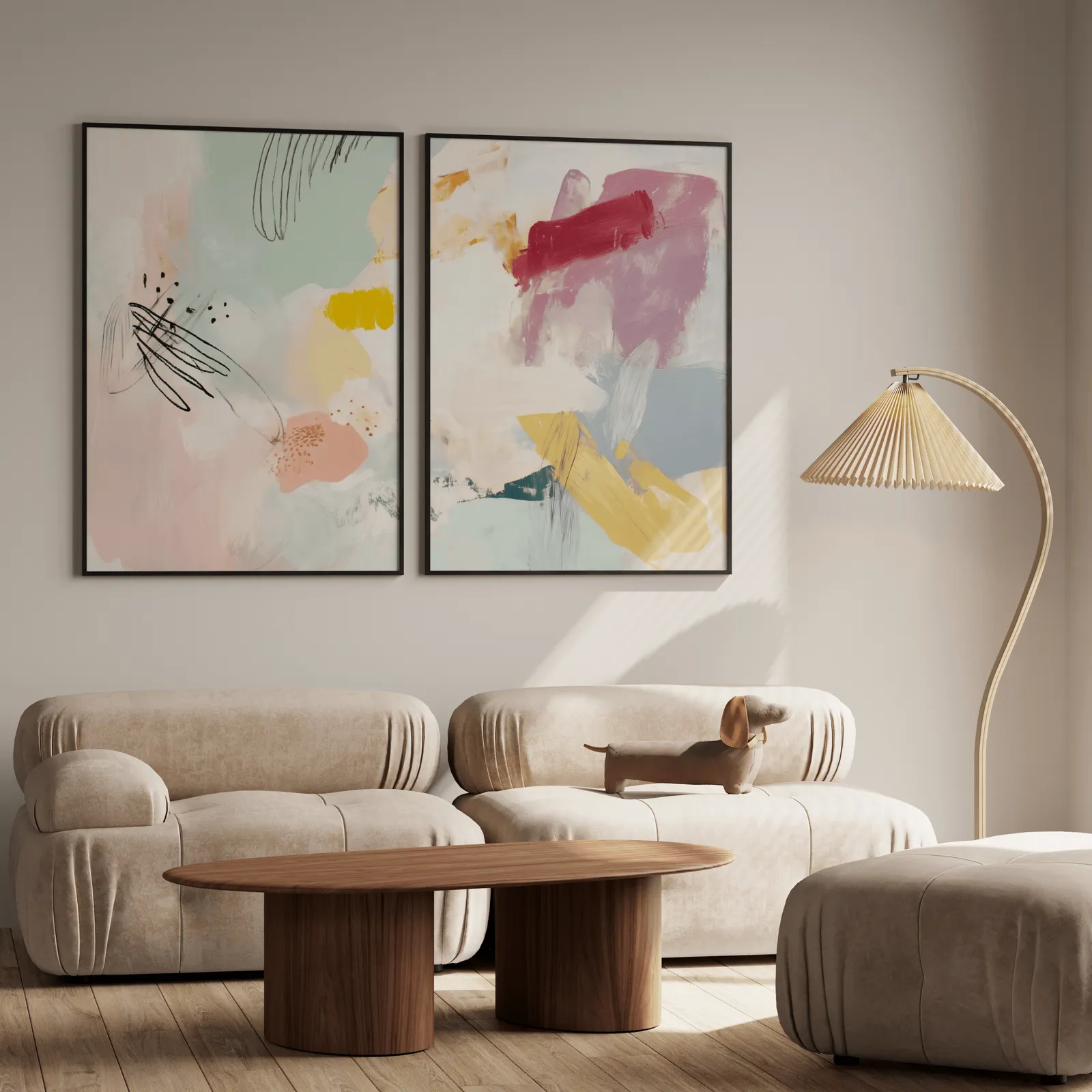 colorful abstract wall art set of 2, above a plush beige sofa with a pleated lamp nearby