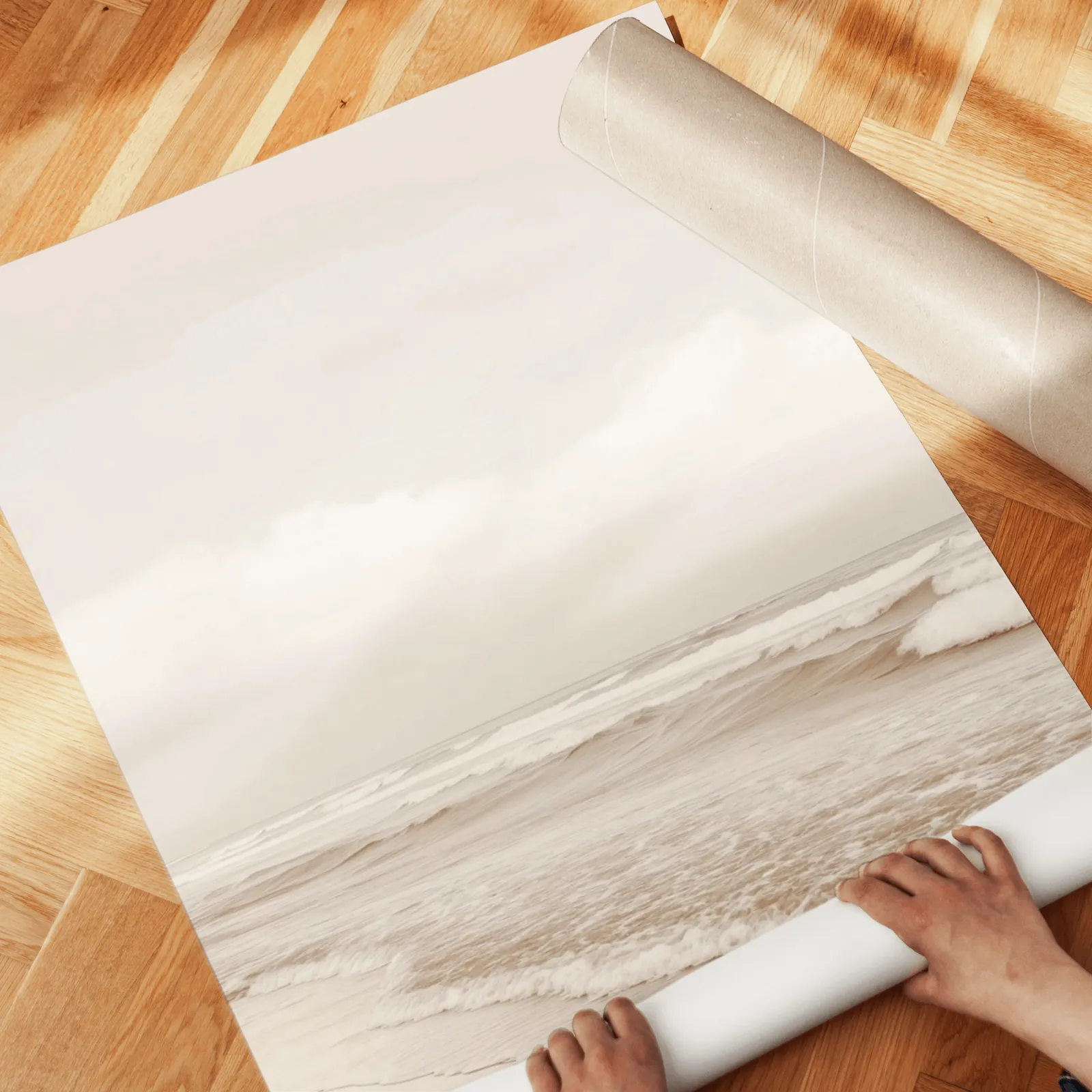 neutral coastal beach triptych wall art, unrolled across a herringbone wood floor by hand